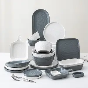 Vendita calda Set di stoviglie in ceramica testurizzata in pietra grigia Set di piatti e ciotole di grandi dimensioni