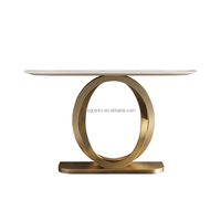 Table console au design unique pour salon, base en acier inoxydable doré, plateau en marbre