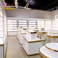Vitrine murale moderne de luxe en acier inoxydable doré, écologique, de haute qualité, pour présentation de parfums, avec rétroéclairage LED et finition laquée blanche