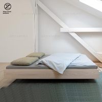 Lit tatami bas sans tête de lit en noyer noir de style nordique japonais, sur mesure pour chauffage au sol et gîtes