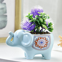 Pot de fleur en céramique émaillée en forme de petit éléphant mignon pour la maison et le jardin en gros