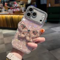 Coque de téléphone à chaîne papillon dégradé avec nœud et coquillage pour iPhone 17 16 15 Pro Max, avec breloques diamantées et lanière scintillante