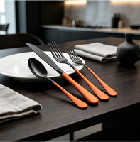 Ensemble de vaisselle plaqué titane noir avec poignée peinte à la bombe orange pour hôtel, restaurant, mariage, traiteur, repas à domicile