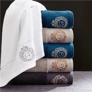 100% cotton custom embroidered logo towel fabric for hotels logo towel