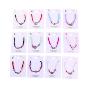 Set di 12 Braccialetti con Ciondoli in Acciaio Inossidabile, Gioielli Colorati con Charm, Regalo per Donne e Ragazze, Accessorio di Moda - Product Image 2
