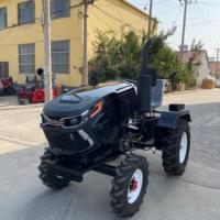 Mini-tracteur compact de 15 CV avec chargeur et pelle rétrocaveuse