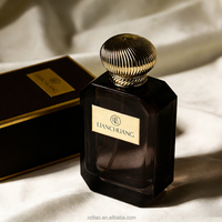 Flacon de parfum de luxe en verre octogonal à facettes avec logo personnalisé, pulvérisateur à sertir et capuchon côtelé rond pour emballage de parfum