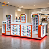 Kiosque de recharge pour téléphones portables au design capsule personnalisé, avec écran d'affichage LED rouge et blanc, stand d'accessoires de vente au détail pour centres commerciaux
