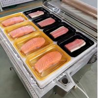 Machine d'emballage sous film sous vide et sous film étirable électrique automatique pour l'emballage de viande fraîche, de bœuf, de steak, de saumon, de fruits de mer en barquette