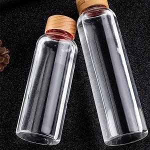 2024 clásico mejor vendedor vaso de vidrio <span class=keywords><strong>agua</strong></span> tetera botella de <span class=keywords><strong>agua</strong></span> de vidrio de borosilicato 1l <span class=keywords><strong>para</strong></span> llenar <span class=keywords><strong>agua</strong></span> - Product Image 1