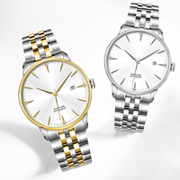 Montre à quartz minimaliste de luxe unisexe avec bracelet en acier inoxydable bicolore, cadran en verre, affichage de la date et fermoir papillon
