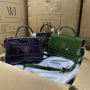 Petit sac carré en cuir verni haut de gamme à face brillante pour femmes sac à bandoulière de niche à la mode pour exportation de Chine