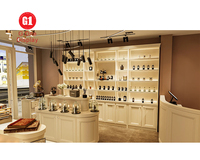Conception d'intérieur de boutique de parfums sur mesure, présentoir mural moderne pour cosmétiques, présentoir de magasin de parfums sur mesure
