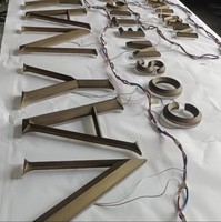 Enseignes métalliques 3D personnalisées en bronze jaune, en relief et rétroéclairées, pour numéros de porte numériques, immobilier et panneaux d'hôtel