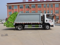 Camion compacteur de déchets à chargement arrière manuel FAW Jiefanghu VH 4x2 - 8-12 mètres cubes pour une collecte efficace des déchets municipaux