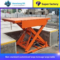 Plateforme élévatrice à ciseaux fixe personnalisée, élévateur hydraulique de marchandises pour l'entrepôt d'usine, levage de marchandises