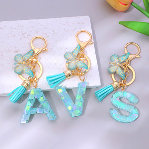 Llavero <span class=keywords><strong>de</strong></span> Resina Brillante con Letra Inicial, Dije <span class=keywords><strong>de</strong></span> Mariposa, Borla Turquesa, Letras <span class=keywords><strong>de</strong></span> la A a la Z en Resina - Product Image 1