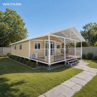 Maison conteneur moderne extensible de luxe de 30 pieds avec structure blanche, caractéristiques imperméables et résistantes au vent, idéale pour hôtel ou bureau