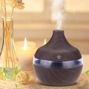 Mini Humidificador 2025 de 300 ml con Aspecto de Madera, Difusor de Aroma Ultrasónico USB, Iluminación LED, 4 Horas de Duración, 35dB, Lámpara Nocturna de Mesa Eléctrica - Product Image 1