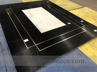 Médaillon en marbre noir Marquina et marbre blanc, découpé au jet d'eau, avec incrustations de lignes en laiton et cuivre pour cabine d'ascenseur
