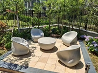 Table ronde et 4 chaises de jardin en ciment GRC moderne pour l'extérieur