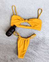 Venta al por mayor personalizado estilo caliente señoras dividir traje de baño niñas micro gran tamaño blanco cadena bikini traje de baño