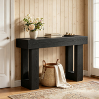 Table console moderne de luxe en bois massif noir avec cadre en tréteaux creux, profondeur réduite, meubles de salon