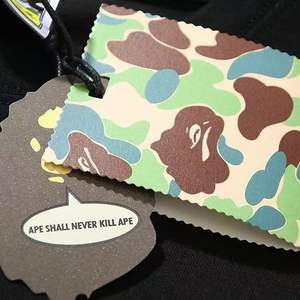 Nouveau t-shirt camouflage imprimé en pur coton tendance pour hommes et femmes, coupe ample à manches courtes et col rond APE. - Product Image 3