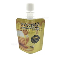 Conçu sur mesure Pochette à presser sans BPA Emballage alimentaire en plastique refermable en feuille d'aluminium Support de buse réutilisable Pochette pour miel