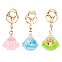 Nouveau design OEM ODM, vente en gros, porte-clés créatif personnalisé en acrylique avec mini liquide, flotteur marin en résine 3D, sable mouvant et paillettes en alliage