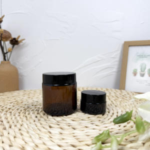 Venta al por mayor 2oz 50ml 20g Olor a prueba de niños Negro Blanco Frascos de vidrio con tapas CR para el paquete de alimentos - Product Image 4