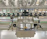Remplisseuse de liquides par gravité haute précision à 8 têtes, précision de ±0,5 % pour le traitement des liquides (vinaigre, sauce soja, produits alimentaires)