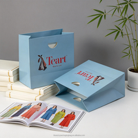 Sacs en papier d'art de luxe personnalisés OEM/ODM avec poignée découpée, en matériaux recyclés, pour le shopping, la vente en gros de vêtements et de bijoux