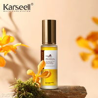 Huile essentielle de maca biologique naturelle de marque privée, produits de soin des cheveux noirs pour femmes, huile d'argan lissante