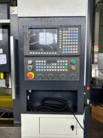 Centre d'usinage vertical CNC VMC1160 avec corps en fonte rigide pour la production en série de pièces en aluminium de communication
