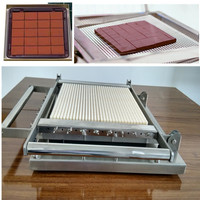 Vente chaude En Acier Inoxydable Double Bras Chinchin Cutter Snack Chocolat Laser Gelée Bonbons Machine De Découpe pour Un Usage Domestique