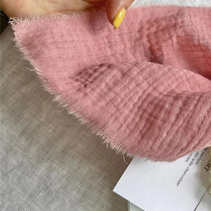 Serviettes de <span class=keywords><strong>gaze</strong></span> <span class=keywords><strong>double</strong></span> couche à franges 100% coton Décoration de table réutilisable pour les mariages d'hôtel Événement Serviettes de table en coton gaufré à pompons - Product Image 6