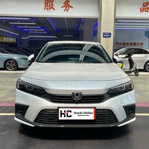 Gli giovani apprezzano le Honda Civic E-CVT 5 posti ibride del 2022 con guida a sinistra, sedili in tessuto, pneumatici R17, auto berlina usate. - Product Image 1
