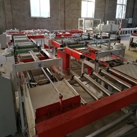 Machine automatique de laminage de feuilles d'aluminium pour panneaux muraux en plaques de plâtre et dalles de plafond