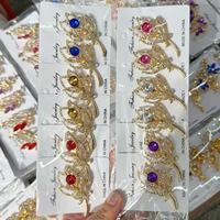 Broche en strass brillants en alliage doré, épingle de revers de luxe incrustée de cristaux, épingle de sûreté pour hijab et foulard, pour la décoration de vêtements anti-exposition