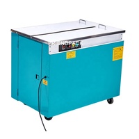 Machine de cerclage semi-automatique verticale pour cartons, caisses et emballages avec bande PP
