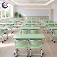 Mobilier scolaire de haute qualité pour les salles de classe : bureaux et chaises doubles en métal réglables en hauteur pour les élèves.