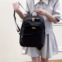 Sac à dos étudiant de grande capacité, imperméable et léger, idéal pour les voyages, les affaires et les activités quotidiennes en extérieur, unisexe, vente en gros.