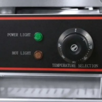 Nouvelle machine à crêpes électrique portable 2-en-1 à haute productivité pour usage commercial, idéale pour la fabrication de cornets de glace et de gaufres.