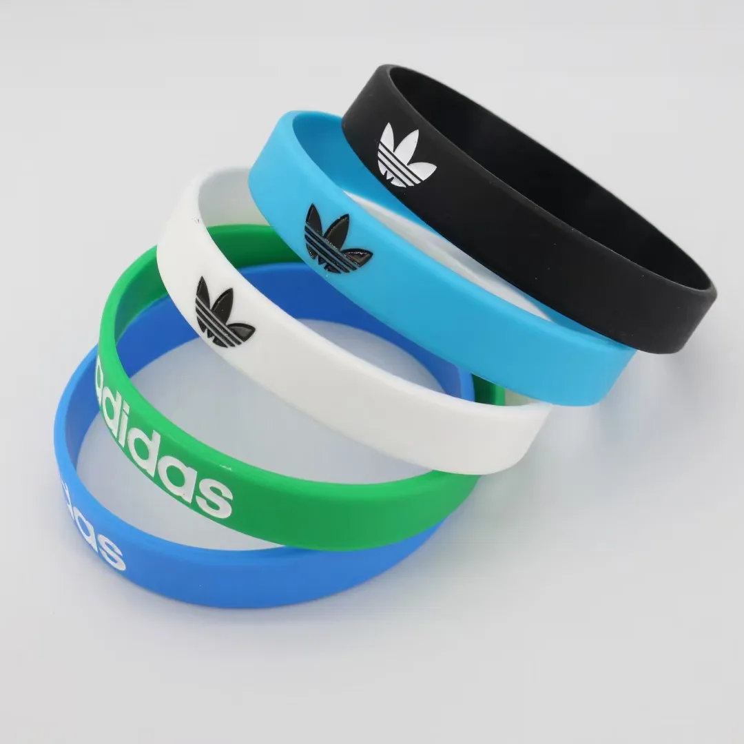 Popular custom debossed filling color logo silicone wristbands bracelets, Multicolor filled logo rubber bracelets wrist bands