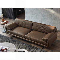 Ensemble de canapés en cuir véritable, moderne et luxueux, idéal pour les espaces de réception professionnels et les hôtels