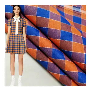 ผ้าทอจากแอฟริกาเส้นด้ายโพลีเอสเตอร์ย้อมสีสำหรับชุดนักเรียนผ้าลายตามสั่ง100%