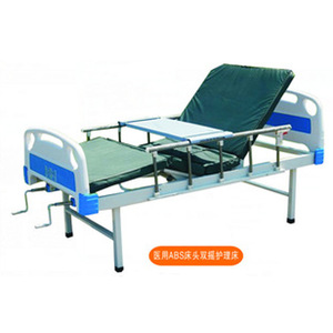 Lit médical multifonctionnel manuel Jiaxin avec barrière de sécurité pour les soins aux patients à domicile - Product Image 1