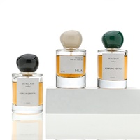 Vente en gros de flacons de parfum ronds en verre vides de 30 ml, 50 ml et 100 ml avec un nouveau design de bouchon