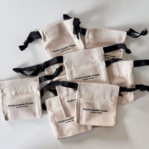 Bolsa de Regalo de Algodón Calico con Logotipo Personalizado, Bolsa Ecológica de Algodón Orgánico Reciclable con Cordón para Joyería y Anillos, Pegatinas Negras para Velas - Product Image 1